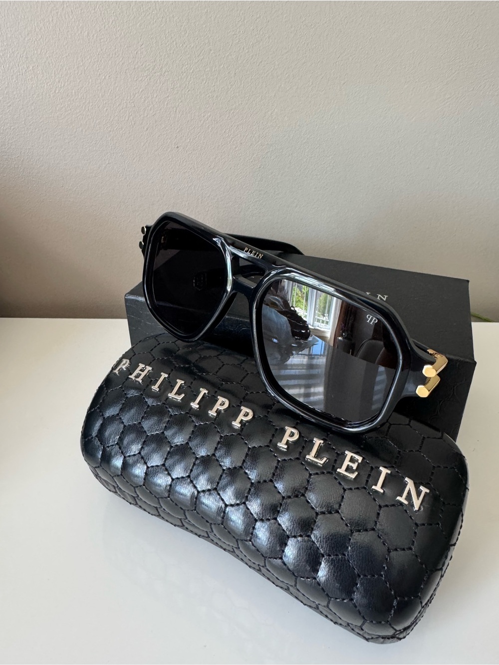 Philipp Plein Black Sunglasses with Gold Accents